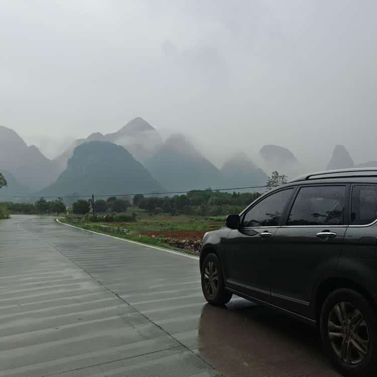 Furong Ancient Town beautiful waterfall drop view under houses